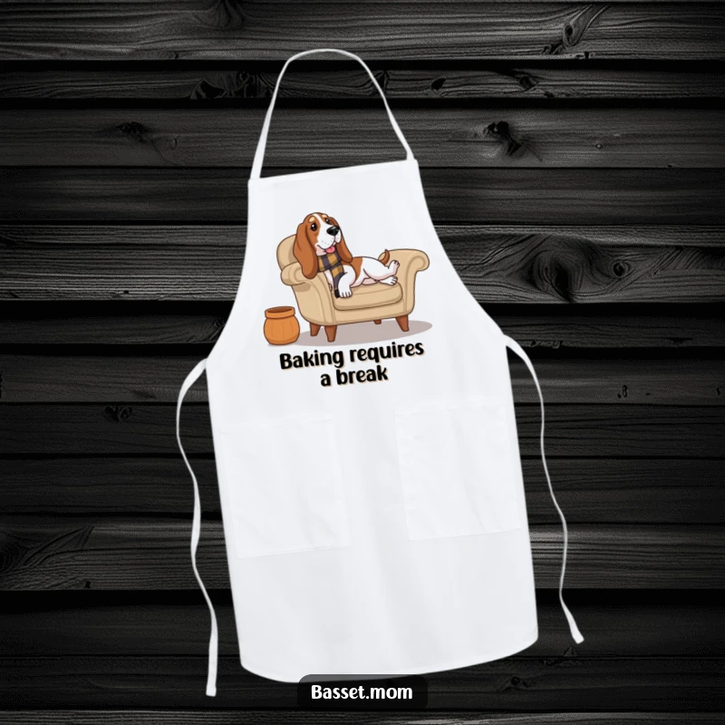 Funny Basset Hound wearing a scarf lounges on a cozy armchair, bringing loungewear humor and style to this practical apron.