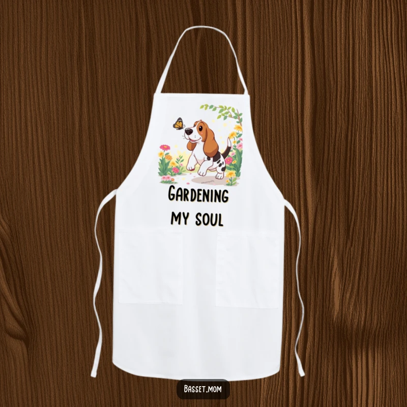 Funny Basset Hound Apron: A dog chases a butterfly in a garden, adding humor to kitchen tasks.