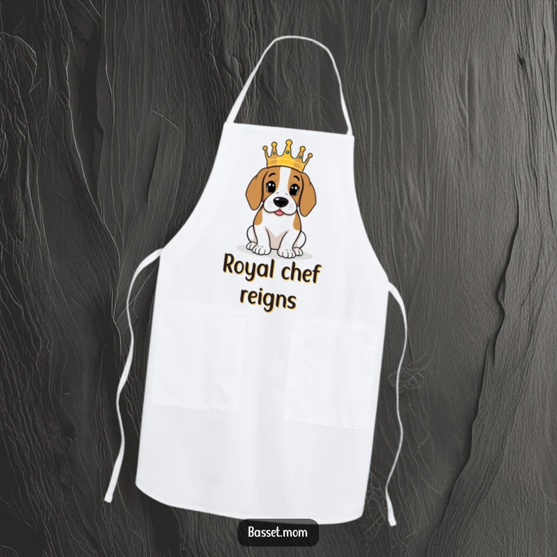 Funny Basset Hound wearing crown, surveying its kingdom, protective kitchen apron, humorous royal gift.