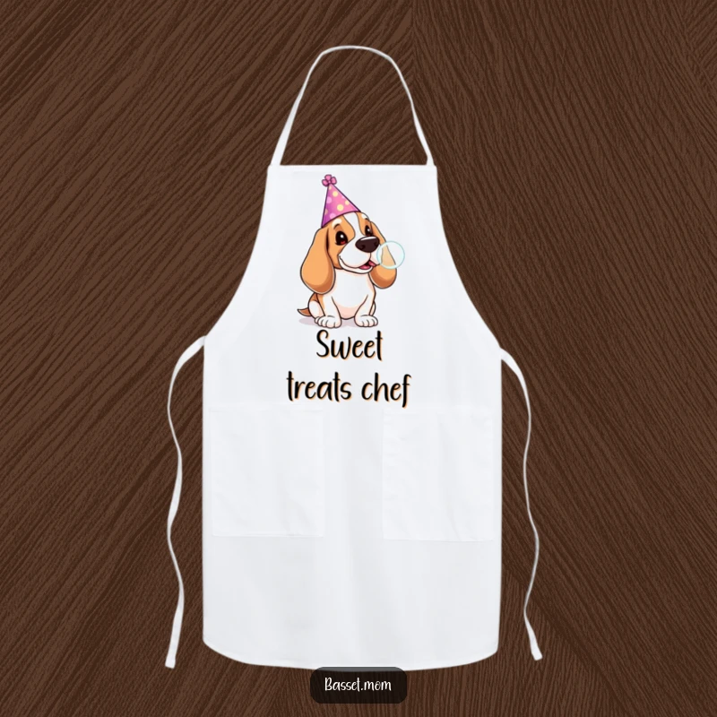 Funny Basset Hound apron featuring a dog in a party hat blowing a lollipop bubble, a humorous and practical kitchen accessory.