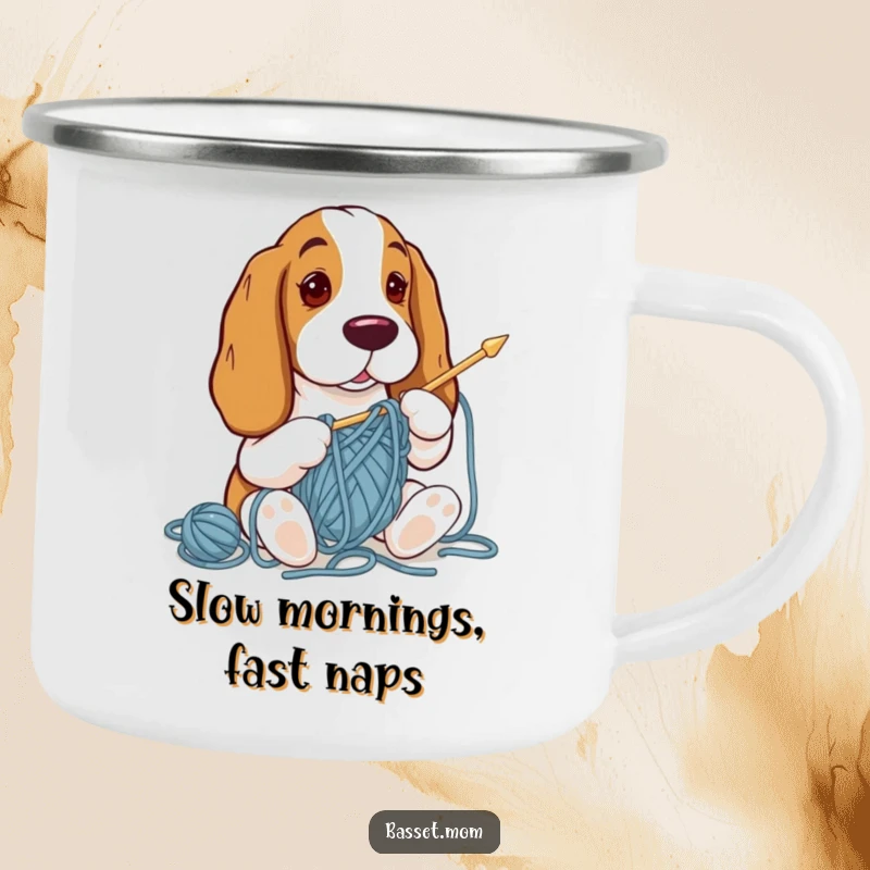 Funny Basset Hound knitting amidst tangled yarn, printed on a durable enamel camping mug for adventurous souls.