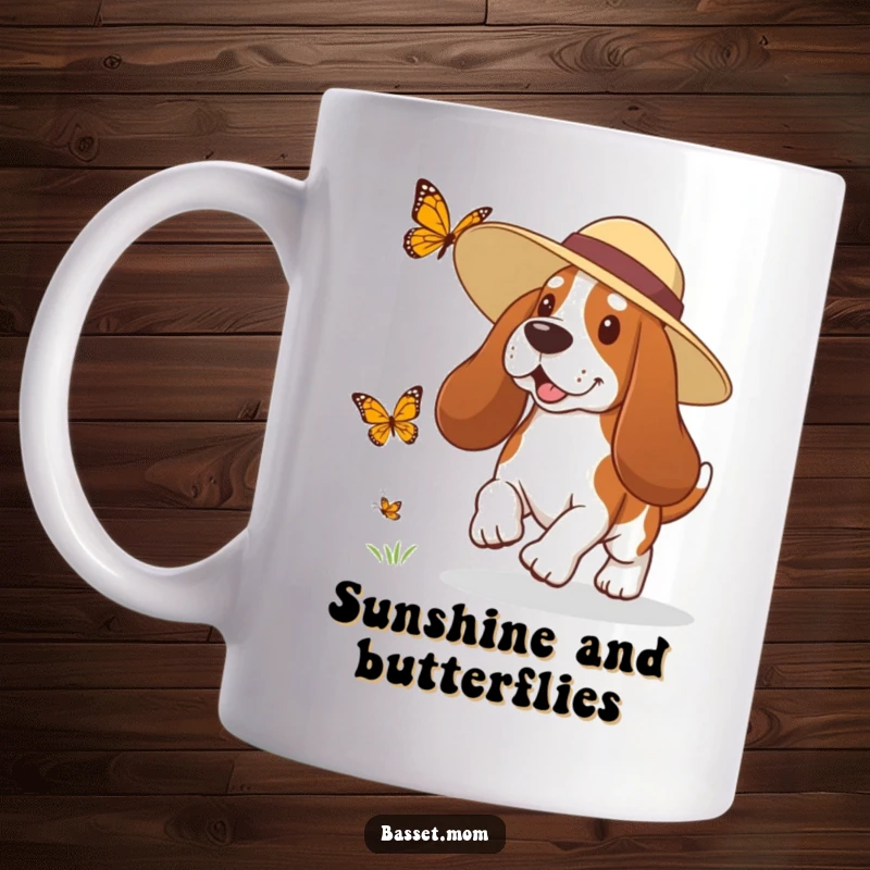 Funny Basset Hound mug showing a dog in a sun hat playfully chasing a butterfly, capturing a moment of outdoor fun.
