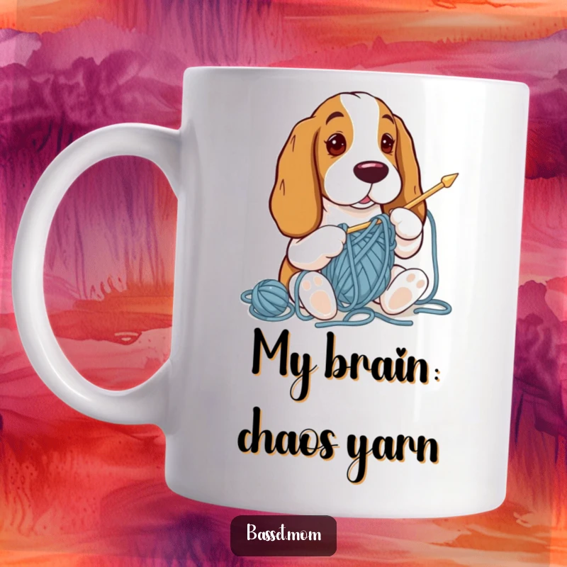 Funny Basset Hound knitting with huge needles, completely tangled in yarn, looking confused on a coffee mug.