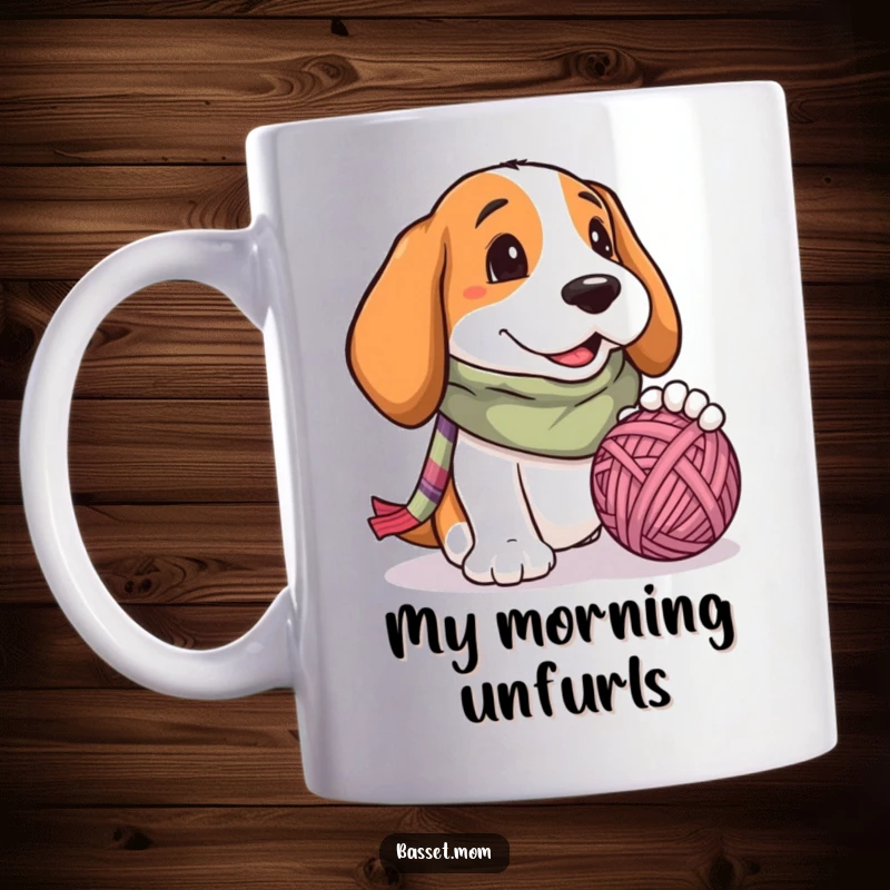 Funny Basset Hound mug with a colorful scarf, playfully batting a tangled yarn ball, showcasing its joyful and energetic spirit.