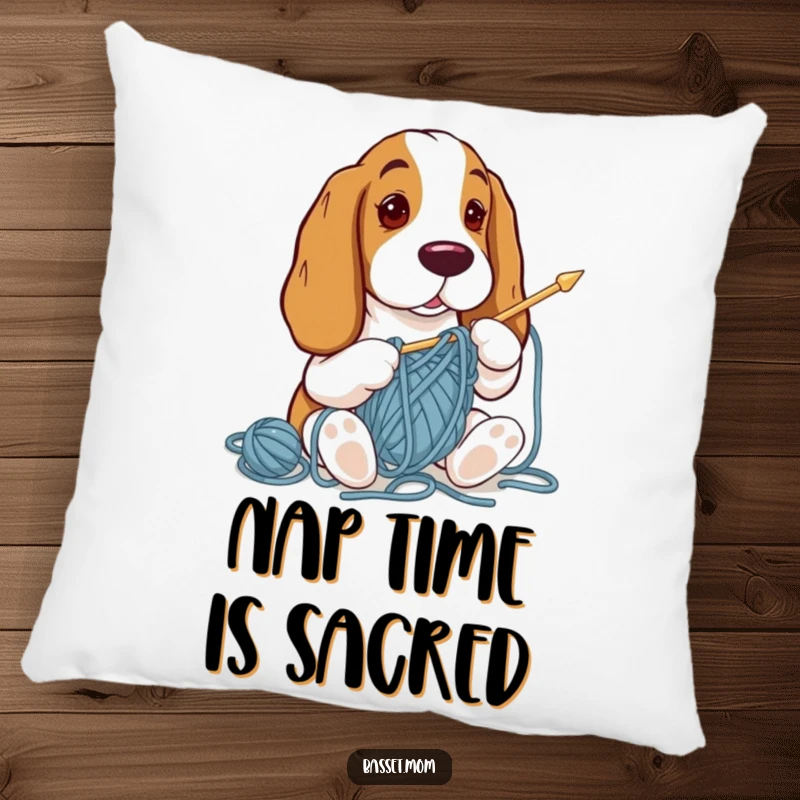 Funny Basset Hound pillow depicting a dog tangled in yarn during a knitting attempt, soft and humorous home decor.