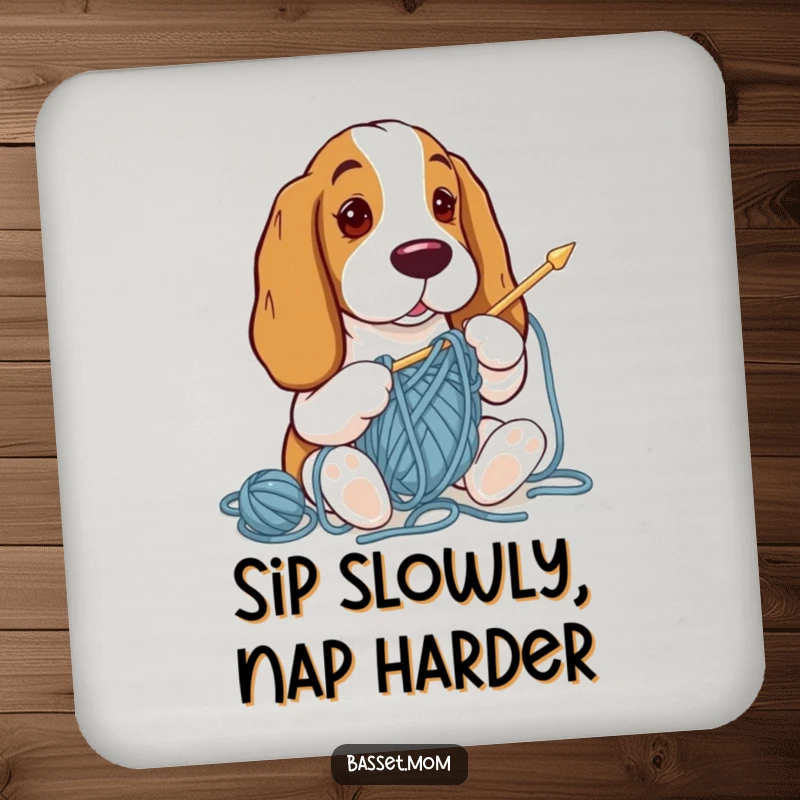 Funny Basset Hound coaster showing a dog tangled in yarn while trying to knit, protecting drink surfaces.