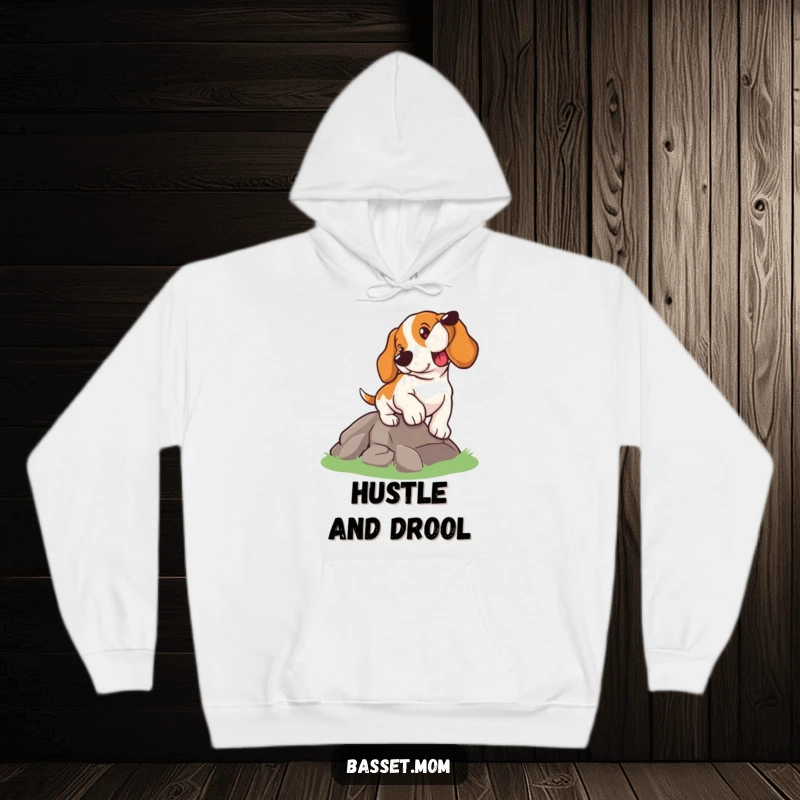 Funny Basset Hound hoodie, a dog determinedly climbing a hill, offering warmth and inspiration, a humorous and cozy gift.