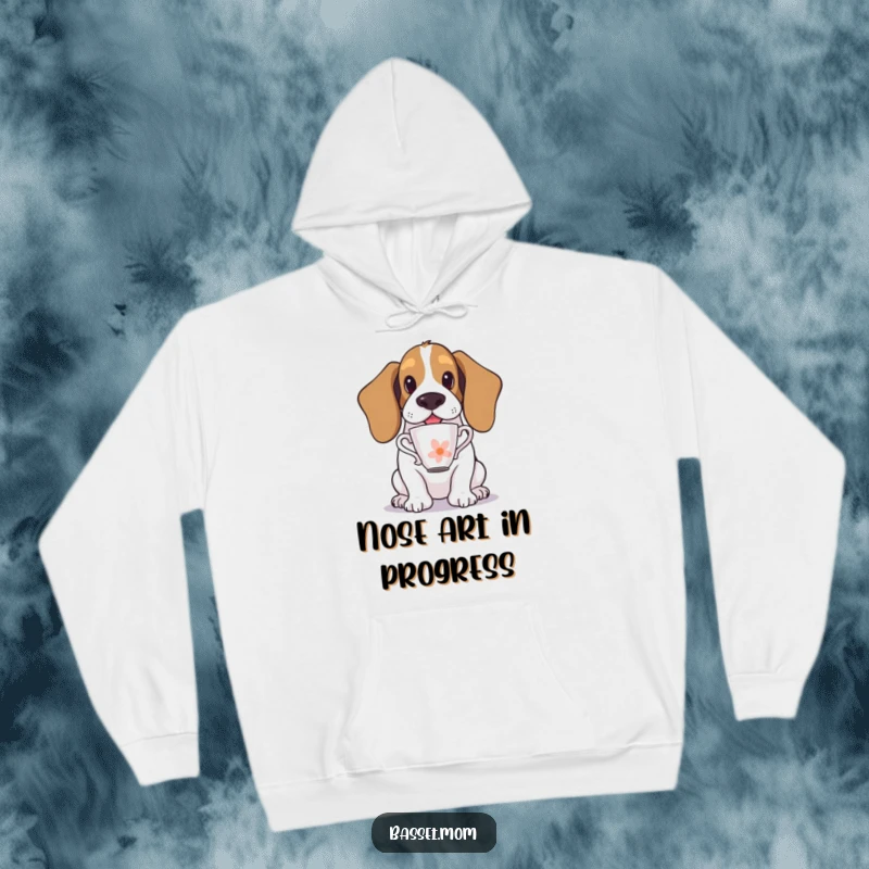 Funny Basset Hound hoodie featuring a dog balancing a teacup on its nose, embodying humorous focus and cozy relaxation.