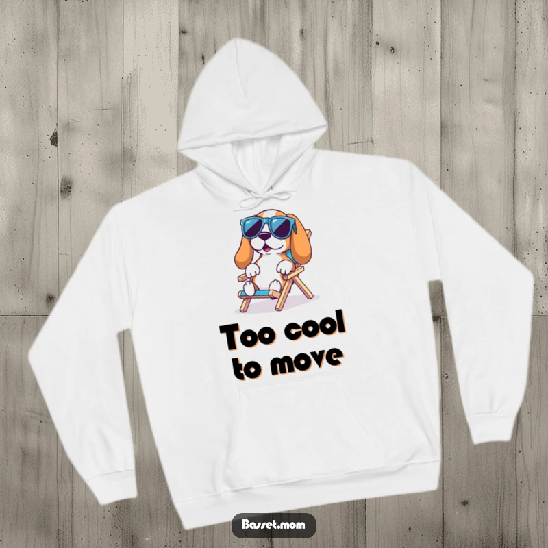 Funny Basset Hound Beach Hoodie: A Basset hound in cool sunglasses lounges on a tiny chair, keeping you cozy and cool, funny gift.