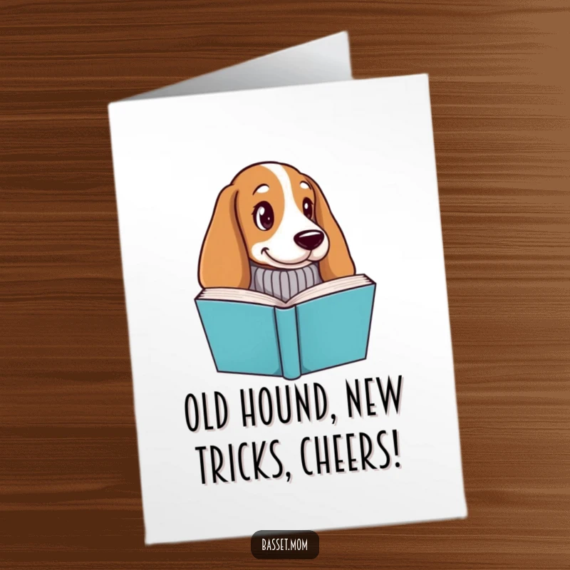 Funny Free Printable Birthday Card: Basset hound in knitted sweater, peeking from behind a book, cozy downloadable art.