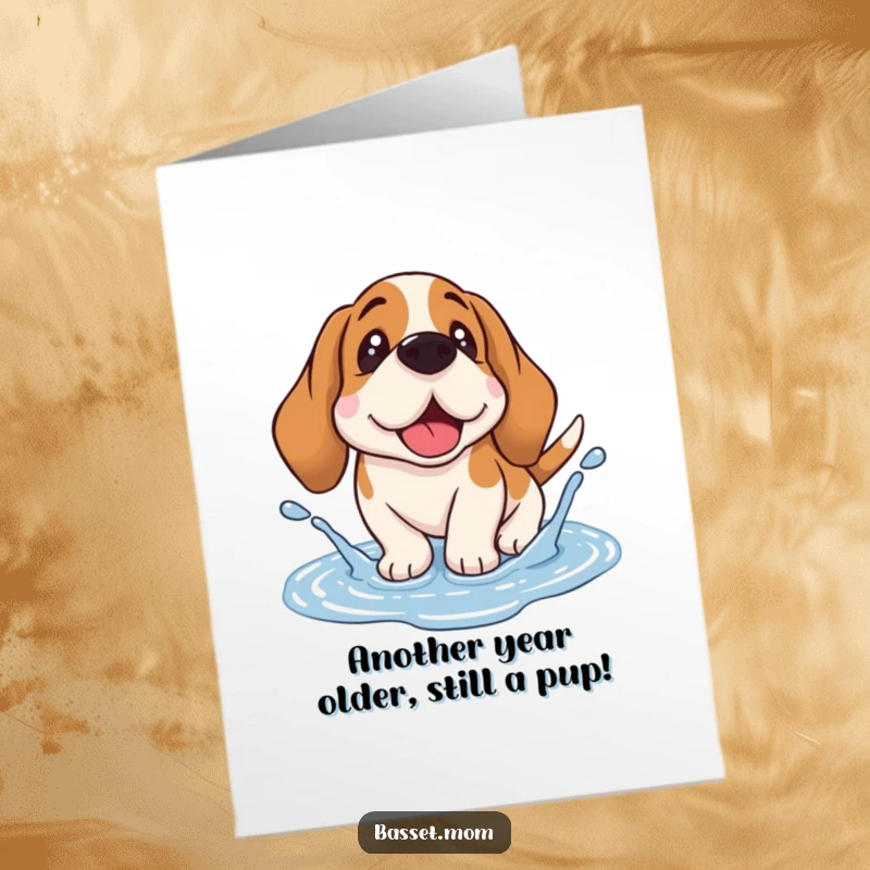 Funny Free Printable Birthday Card: A joyful Basset Hound with droopy ears gleefully splashing in a puddle. Pure birthday fun!