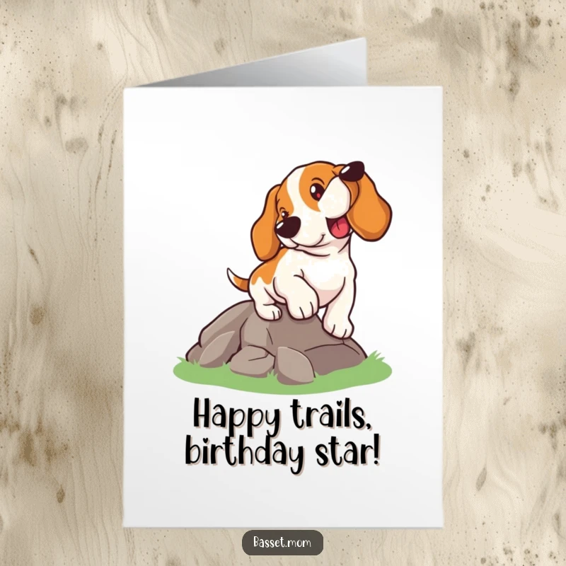 Funny Free Printable Birthday Card: A Basset Hound with a determined face climbing a small hill, symbolizing birthday goals.