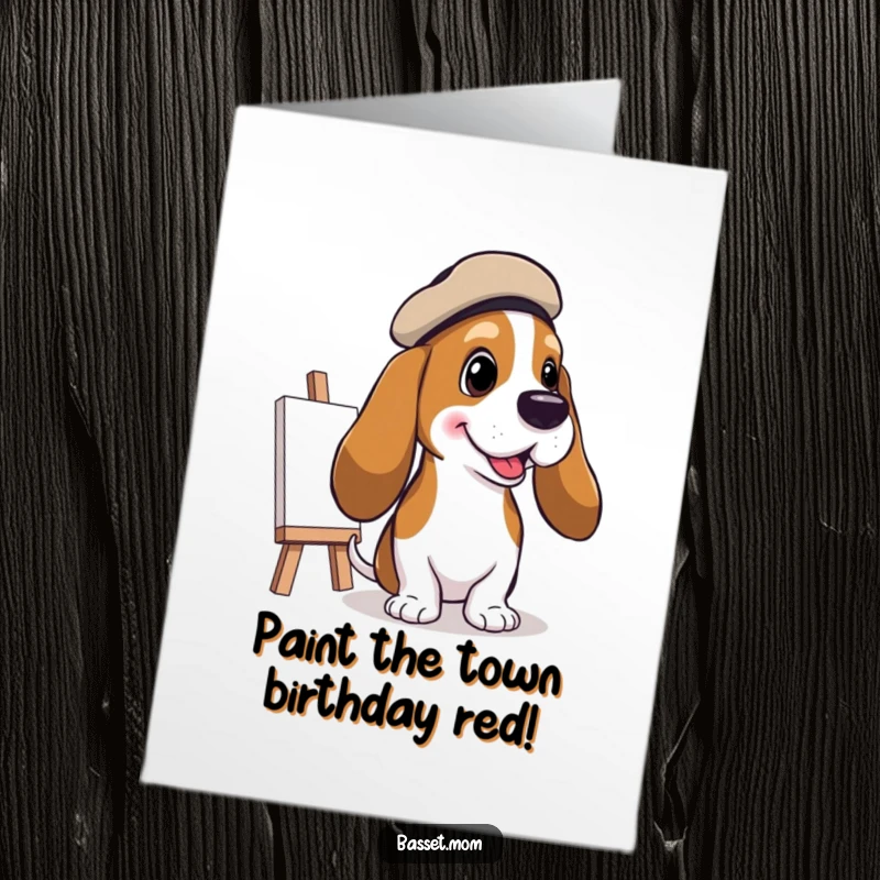 Funny Free Printable Birthday Card: Basset Hound in a beret painting a cheerful picture, celebrating artistic flair.