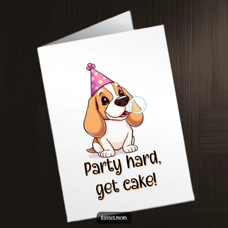 Funny Free Printable Birthday Card: A Basset Hound wearing a party hat, expertly blowing a giant bubble with a lollipop.