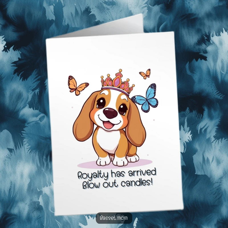 Funny Free Printable Birthday Card: A Basset Hound princess in a tiara joyfully chases a butterfly, ready to send birthday wishes.