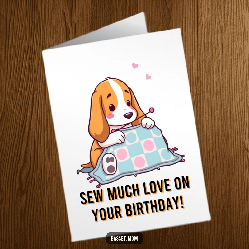 Funny Free Printable Birthday Card: A Basset Hound happily stitches a quilt, ready to celebrate your special day.