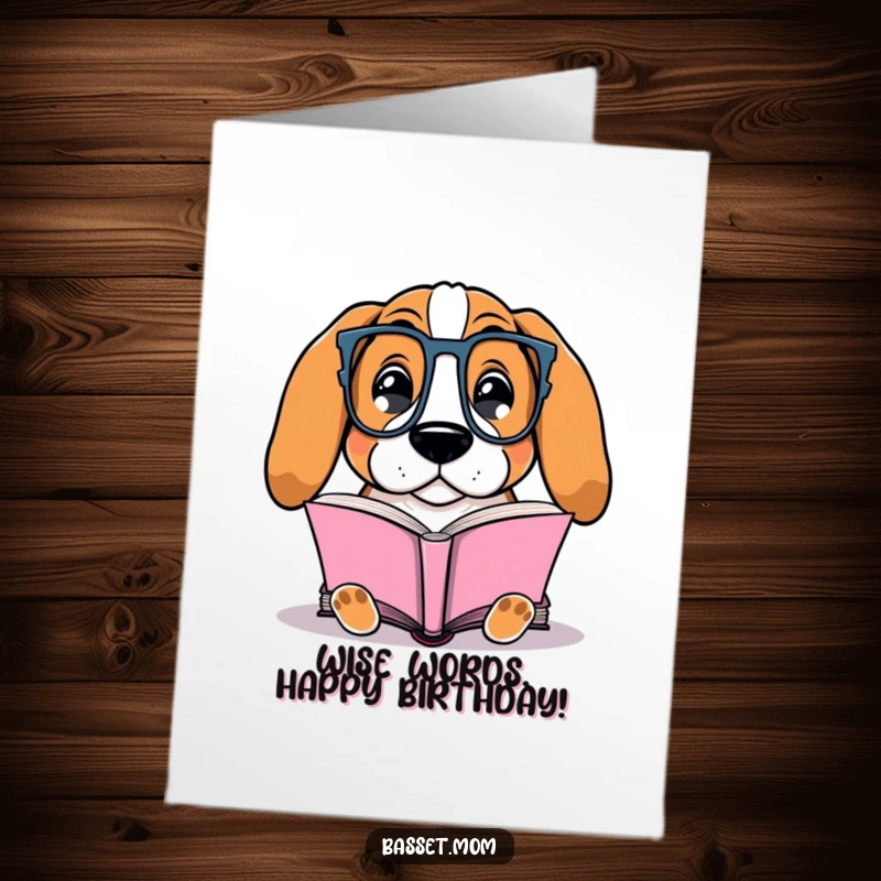 Funny Free Printable Birthday Card: A Basset Hound wearing glasses contentedly reading a book.
