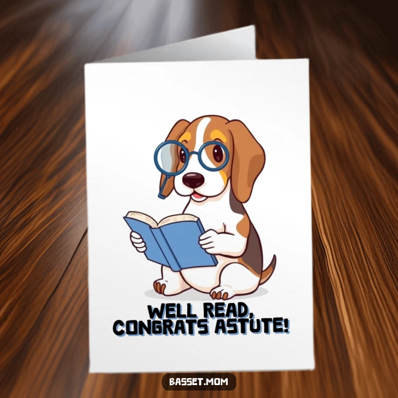 Funny Free Printable Congratulations Card: A basset hound with a monocle absorbed in reading a small, charming book.