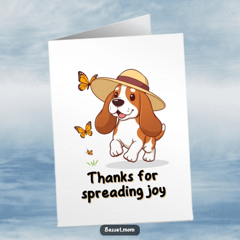 Funny Free Printable Thank You Card: A Basset Hound in a sun hat playfully chasing a colorful butterfly outdoors.