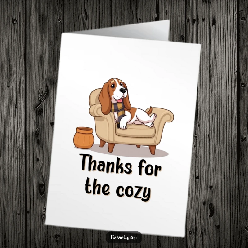 Funny Free Printable Thank You Card: A Basset Hound wearing a scarf lounges contentedly on a cozy armchair, offering thanks.