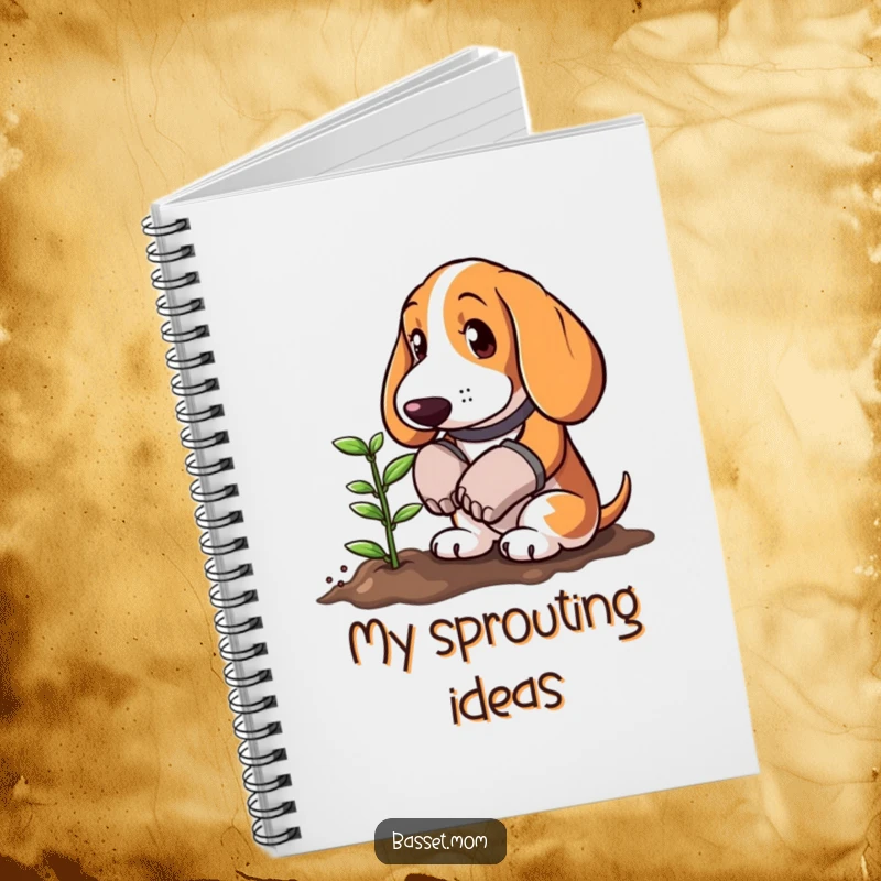 Funny Basset Hound wearing gardening gloves planting a tiny sprout, featured on a notebook cover, inspiring humorous gardening notes and thoughts.