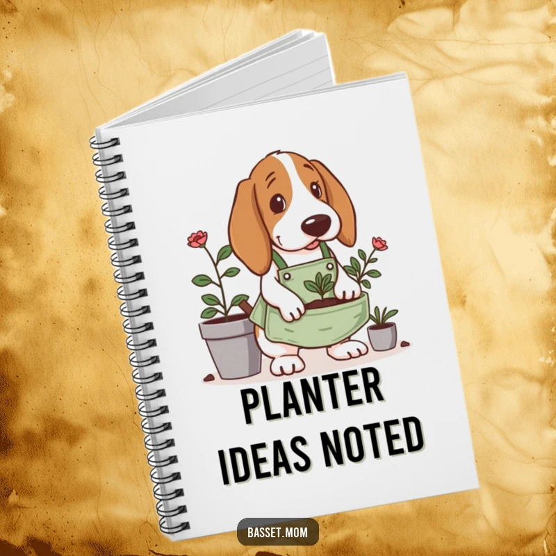 Funny Basset Hound notebook, wearing a tiny gardening apron, digging in a planter, a delightful companion for all your gardening notes.