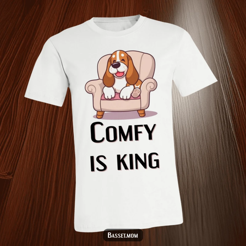Funny Basset Hound t-shirt showing a happy sigh as it lounges comfortably on a cushioned chair, embodying ultimate chill vibes.
