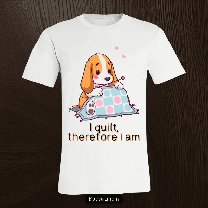 Funny Basset Hound sewing t-shirt featuring a happy dog with a needle, stitching a vibrant quilt, a humorous gift for craft enthusiasts.