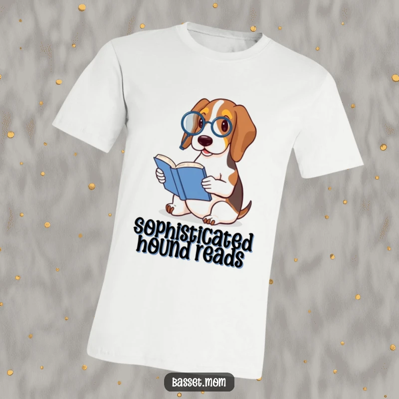Funny Basset Hound t-shirt featuring a distinguished dog wearing a monocle and reading a small book, conveying smart and comical vibes.