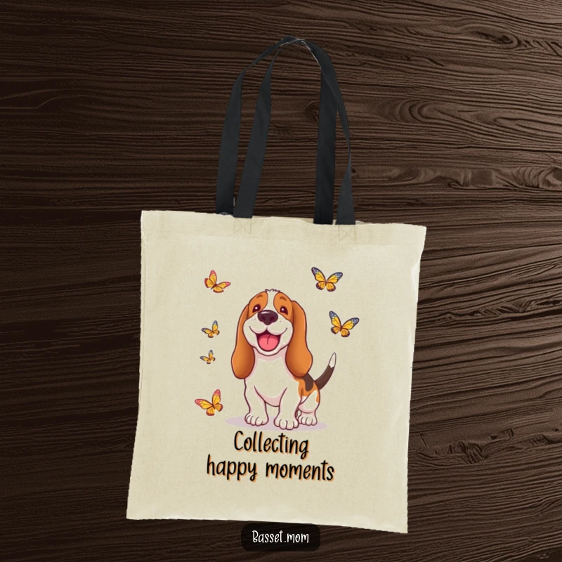 Funny Basset Hound tote bag depicting a happy dog with its tongue out, gleefully chasing fluttering butterflies in a dreamlike setting.