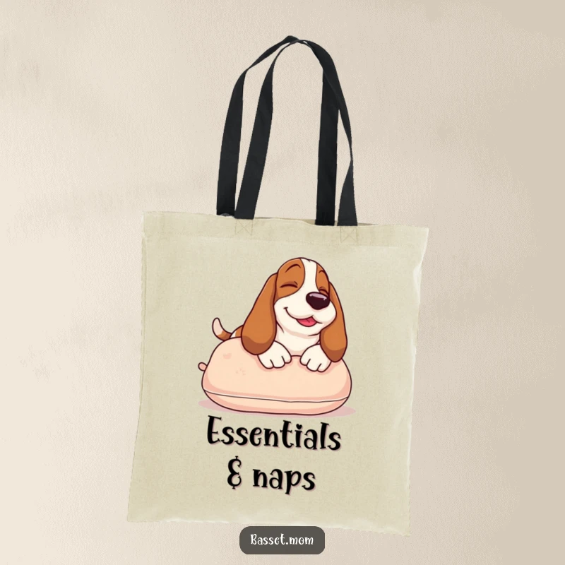 Funny Basset Hound tote bag showing a smiling dog sunbathing on a plush pillow, a humorous accessory for carrying daily necessities.