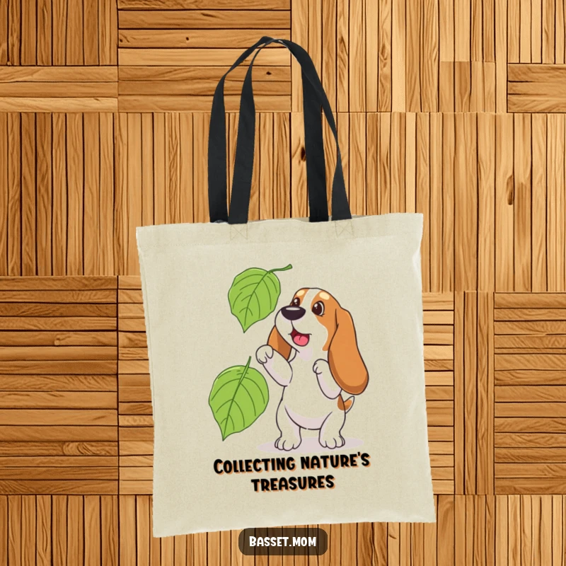 Funny Basset Hound tote bag, featuring a dog playfully chasing a big leaf, ideal for carrying autumnal treasures.