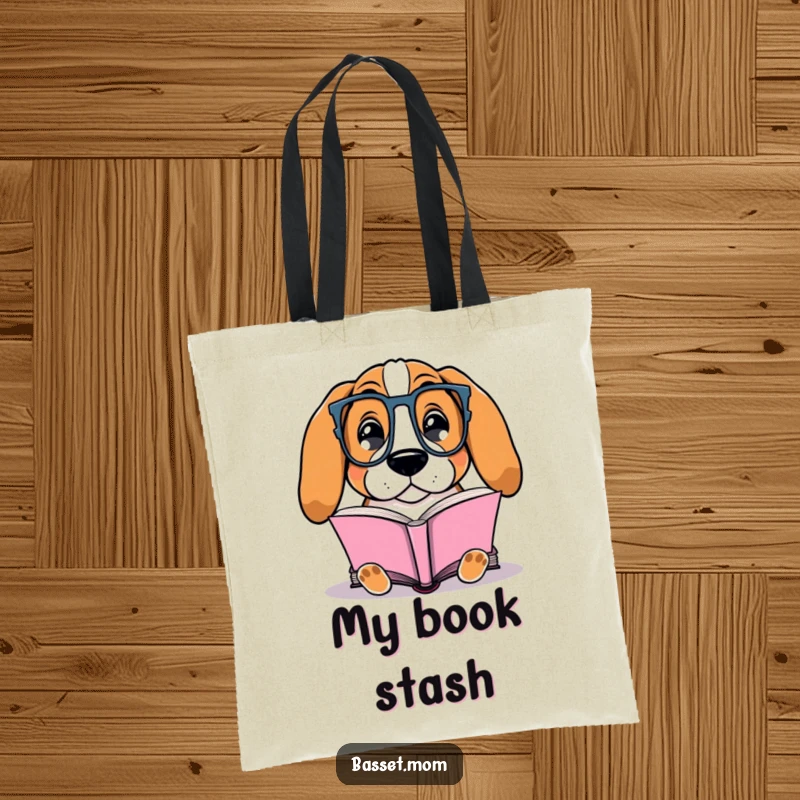 Funny Basset Hound tote bag with a dog wearing glasses contentedly reading a book, perfect for carrying books with humor.