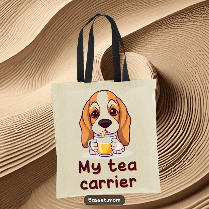 Funny Basset Hound tote bag with a droopy-eared dog gracefully sipping tea, perfect for carrying essentials with elegant humor.