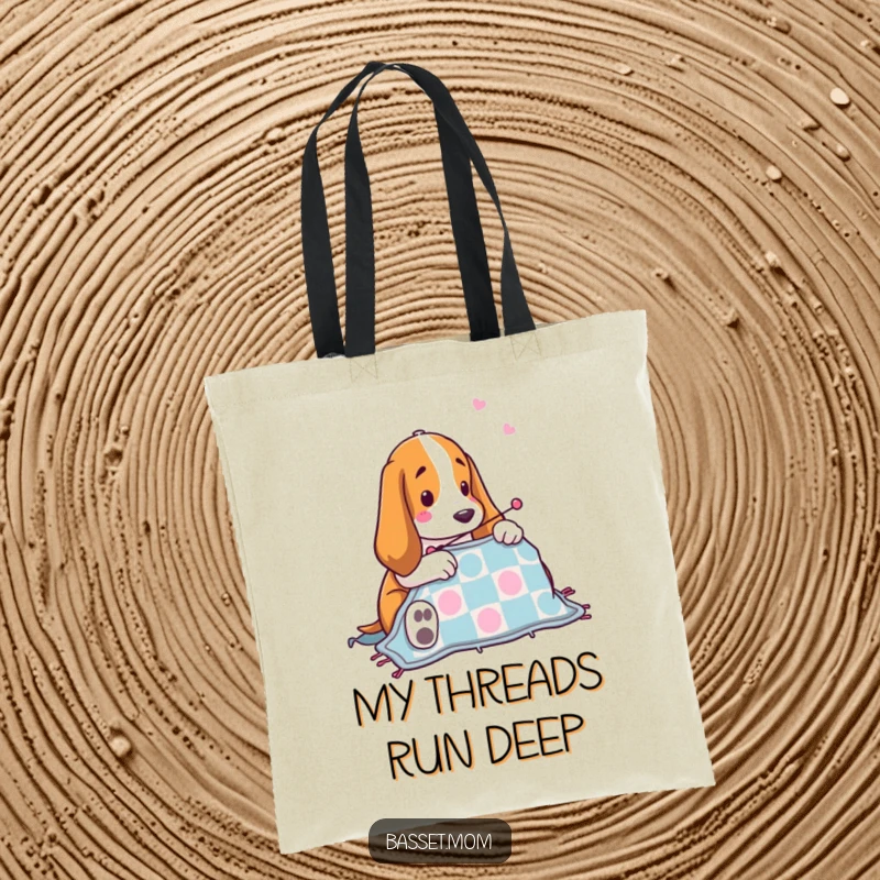 Funny Basset Hound quilting tote bag with a dog artistically stitching a quilt, perfect for carrying craft supplies, a humorous accessory.